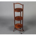 A mahogany circular 3 tier folding cake stand 86cm h x 27cm w x 24cm d