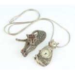 A marcasite cat pendant watch on a silver chain together with a brooch