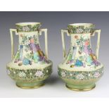 A pair of Japanese baluster 2 handled vases decorated with figures 18cm