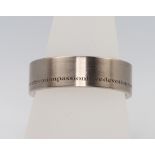 A gentleman's 18ct white gold wedding band engraved Love, Devotion, Passion, size T 1/2, 12.9 grams