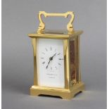 Garrards and Company, a 20th Century carriage timepiece with enamelled dial and Roman numerals
