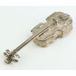 A Victorian repousse silver box in the form of a violin decorated with figures, import marks