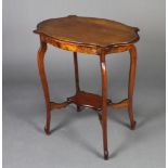 An Edwardian shaped oval 2 tier occasional table raised on cabriole supports 73cm h x 66cm w x