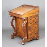 A Victorian rosewood Davenport desk with 3/4 gallery, the pedestal fitted an inkwell drawer above