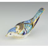 A Royal Crown Derby Imari pattern paperweight of a mountain bluebird with gold stopper 5cm