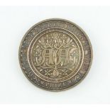 An Edwardian cast silver architectural medallion, 82 grams