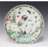 An 18th Century Chinese famille verte shallow dish decorated with birds and insects 35cm Extensively