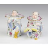 A pair of 19th Century German figures of a lady and gentleman in the form of a pounce pot and an