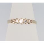 A 9ct yellow gold 5 stone diamond ring, size N, 1.6 grams