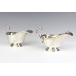 A pair of silver sauce boats with S scroll handles, London 1936, 190 grams