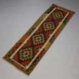 A black, tan and white ground Maimana Kilim runner 198cm x 64cm