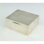 A silver engine turned cigarette box with presentation inscription, London 1933 10.5cm