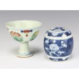 An 18th Century style Chinese pedestal bowl decorated with formal flowers 8cm, a ditto prunus bell