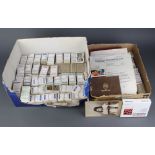 Two shallow boxes containing a collection of Wills, Players cigarette cards and a small collection