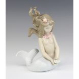 A Lladro figure of a mermaid holding a shell with pearl 1415, 15cm