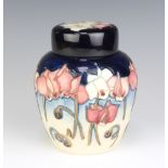 A modern Moorcroft ginger jar and cover decorated juniper berry 15cm