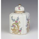 A modern Dresden tea caddy and cover decorated with spring flowers 13cm