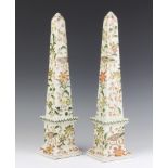 A pair of Chinese ceramic reproduction obelisks on square bases decorated with flowers 41cm