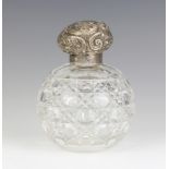 A Victorian silver mounted globular cut glass scent bottle Chester 1898, 12cm The lid is dented