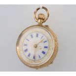 A lady's 14ct yellow gold fob watch with enamelled dial The back cover is detached