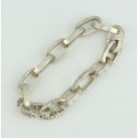 A silver flat link bark finished bracelet, 44 grams