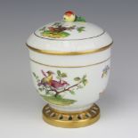 A modern Dresden lidded vase decorated with exotic birds and insects 14cm