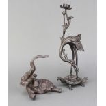 A Japanese bronze candlestick in the form of a stork standing on a turtle 33cm x 11cm x 9cm together