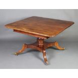 A William IV rectangular mahogany pedestal extending dining table with 1 extra leaf, raised on a