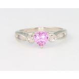 A 9ct yellow gold pink sapphire and diamond ring size H