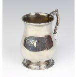 A silver baluster mug with engraved monogram London 1985, maker Asprey and Company, 10cm, 184 grams