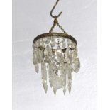 A circular gilt metal 2 tier drop light fitting hung lozenges 19cm x 15cm