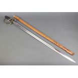 A George V Royal Artillery Officers sword with etched blade and leather scabbard The blade has