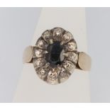 A 9ct yellow gold sapphire and diamond oval cluster ring, size P, 4.6 grams