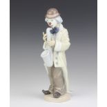 A Lladro figure of a clown playing a saxophone 5471 22cm