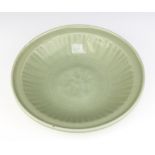 A 19th Century Chinese Celadon shallow dish decorated with flowers 28.5cm This item has been