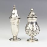 A Victorian repousse silver baluster pepper with floral decoration, London 1884, an octagonal