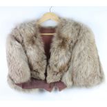 A lady's full length light beaver lamb jacket, a lady's full length fur coat and a fur stole