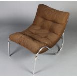 Peter Hoyte, a stylish Mid Century chromium framed easy chair, upholstered in brown material