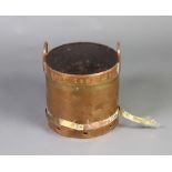 A Home Counties Dairy copper and brass churn converted for use as a coal hod 40cm x 34cm diam.The