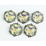 A set of 5 Sterling silver and enamelled buttons decorated with pansies