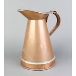 A waisted copper half gallon jug 26cm h x 17cm There is an old repair to the handle and base