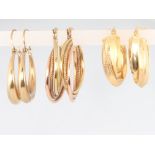 Three pairs of 9ct yellow gold hoop earrings, 6 grams