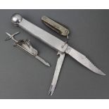 A Redington folding fishing knife with file and clip, a Continental twin bladed fishing knife