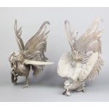 An impressive pair of 19th/20th Century bronze figures of fighting cockerels 38cm x 32cm x 40cm
