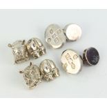 Two pairs of silver cufflinks, 35 grams