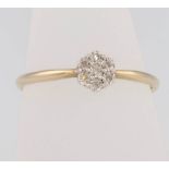 A 9ct yellow gold diamond cluster ring size S, 1.4 grams