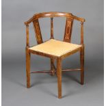 A beech framed Edwardian inlaid mahogany corner chair raised on square tapered supports with X frame
