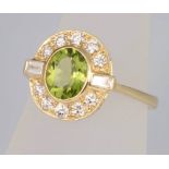 An 18ct yellow gold peridot and diamond cluster ring, the centre stone 1.3ct surrounded by brilliant