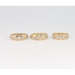 Three 9ct yellow gold diamond set rings size N