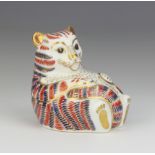 A Royal Crown Derby Imari pattern paperweight of a tiger cub, red stopper 8cm